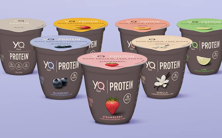 YQ yogurt cups grouped together on a purple background